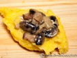 Polenta dumplings stuffed with mushrooms –a traditional recipe from Bucovina