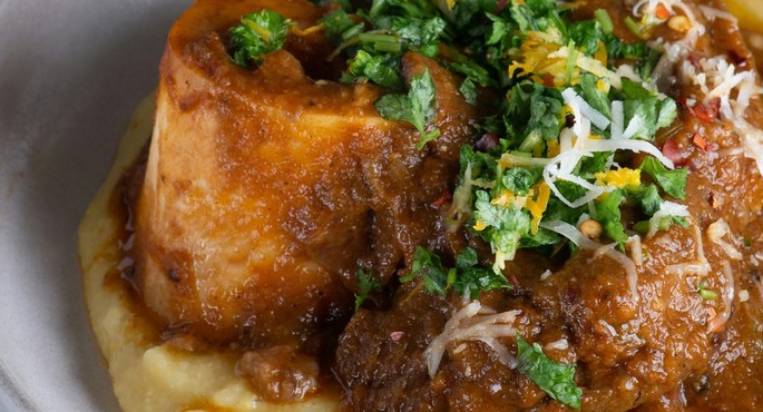 Mămăligă with Cheese and Sour Cream: A Traditional Taste That Varies from One Region to Another