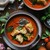 Zuppa tradizionale di fagioli con carne affumicata Zuppa tradizionale di fagioli con carne affumicata